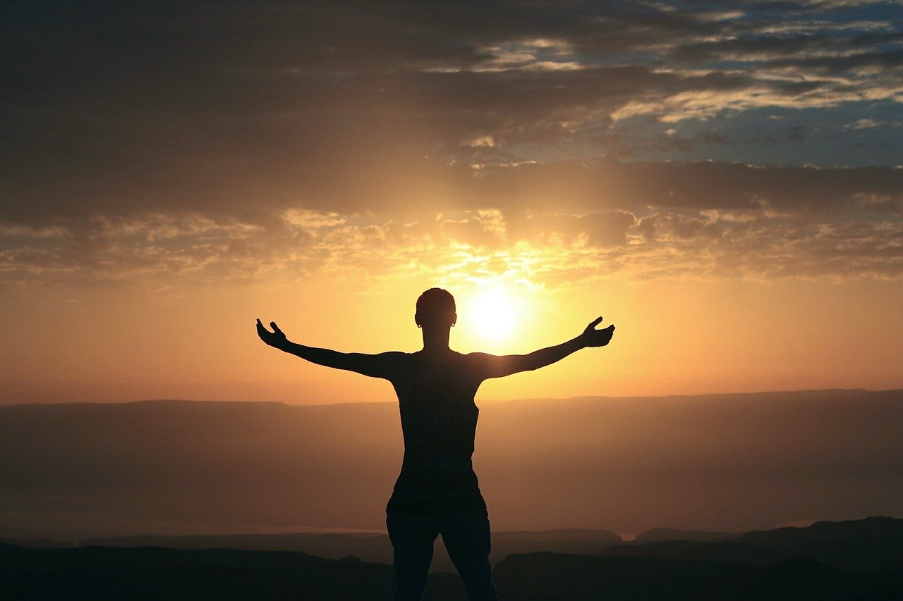 spiritual counselling courses; A women watching the sunset
